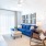 well lit living room with large windows