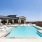 pool with lounge chairs and views