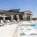 pool with lounge chairs and views